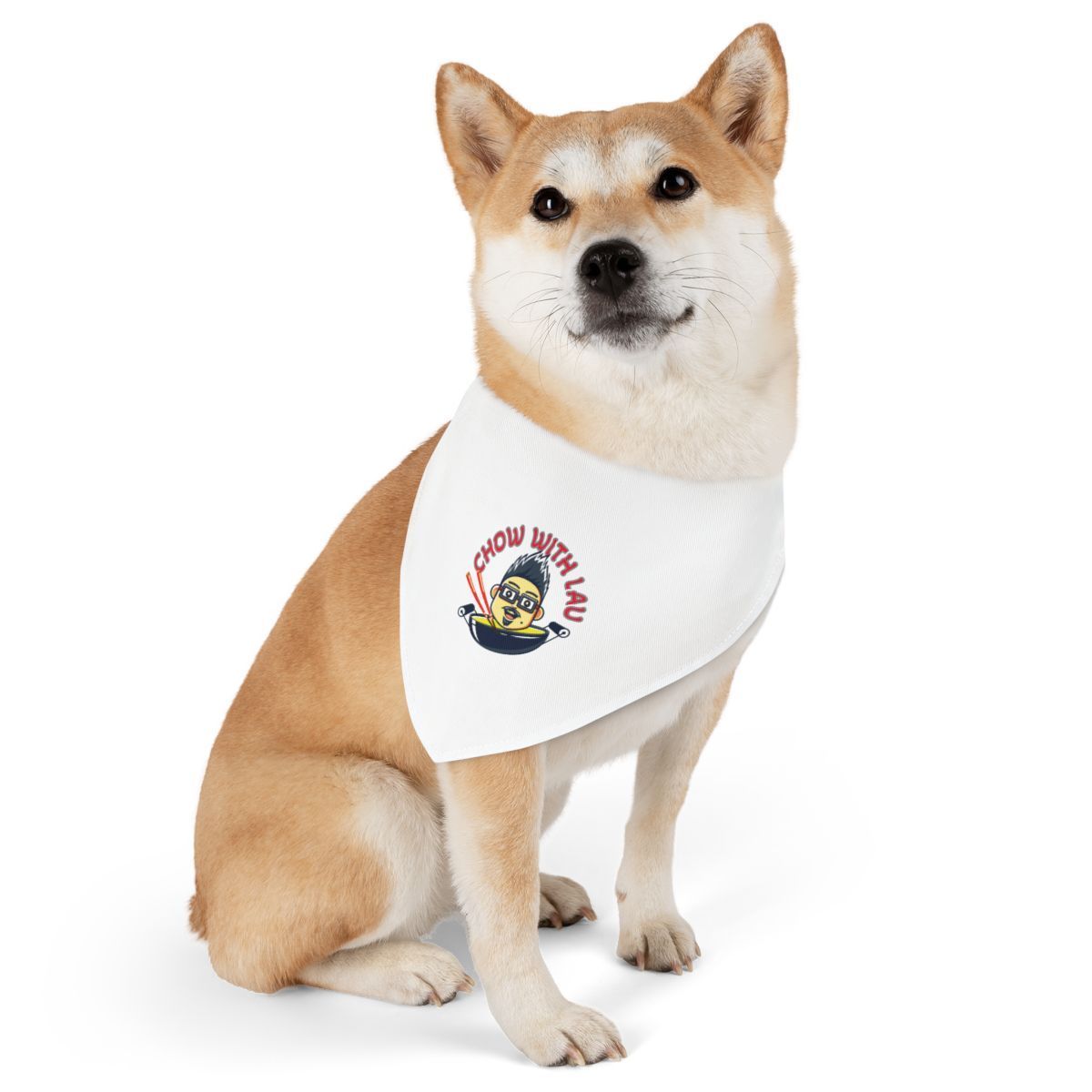 Shiba Inu dog wearing a white bandana with a cartoon graphic and text.