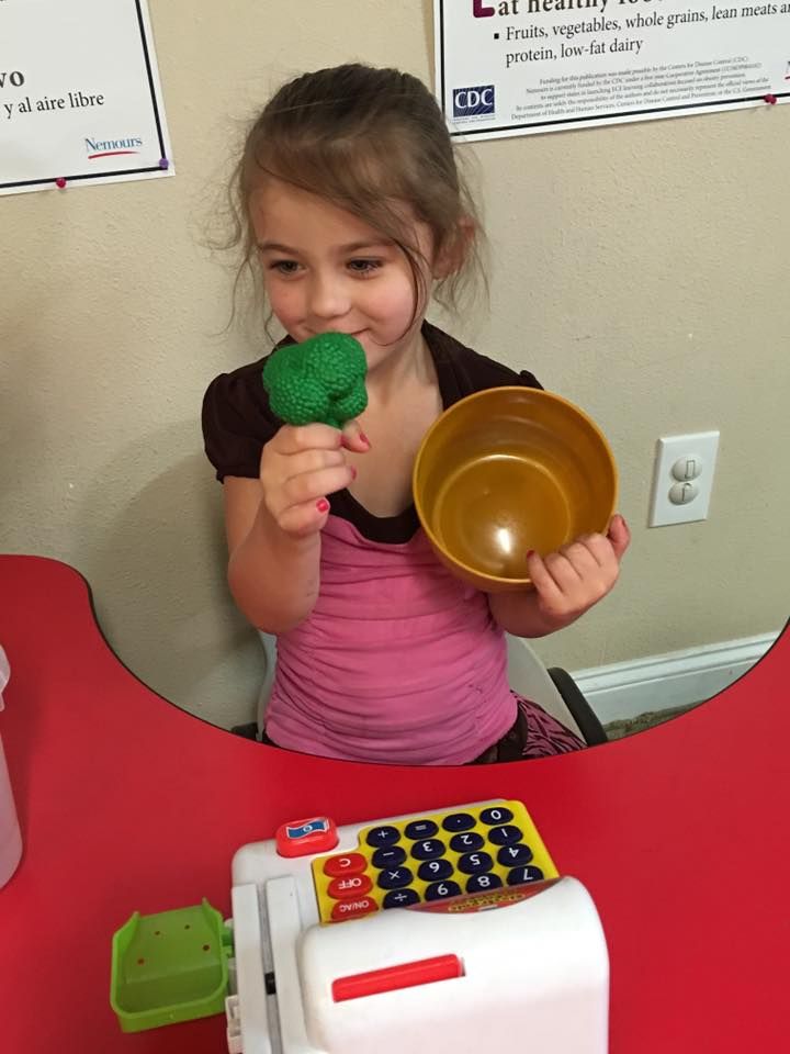 Vicky's Day Care with children playing.
