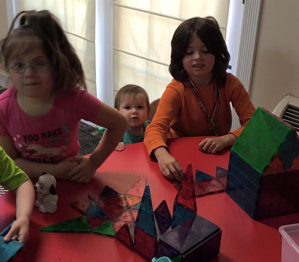 Vicky's Day Care with children playing.