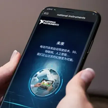 A person is holding a phone that says national instruments on the screen