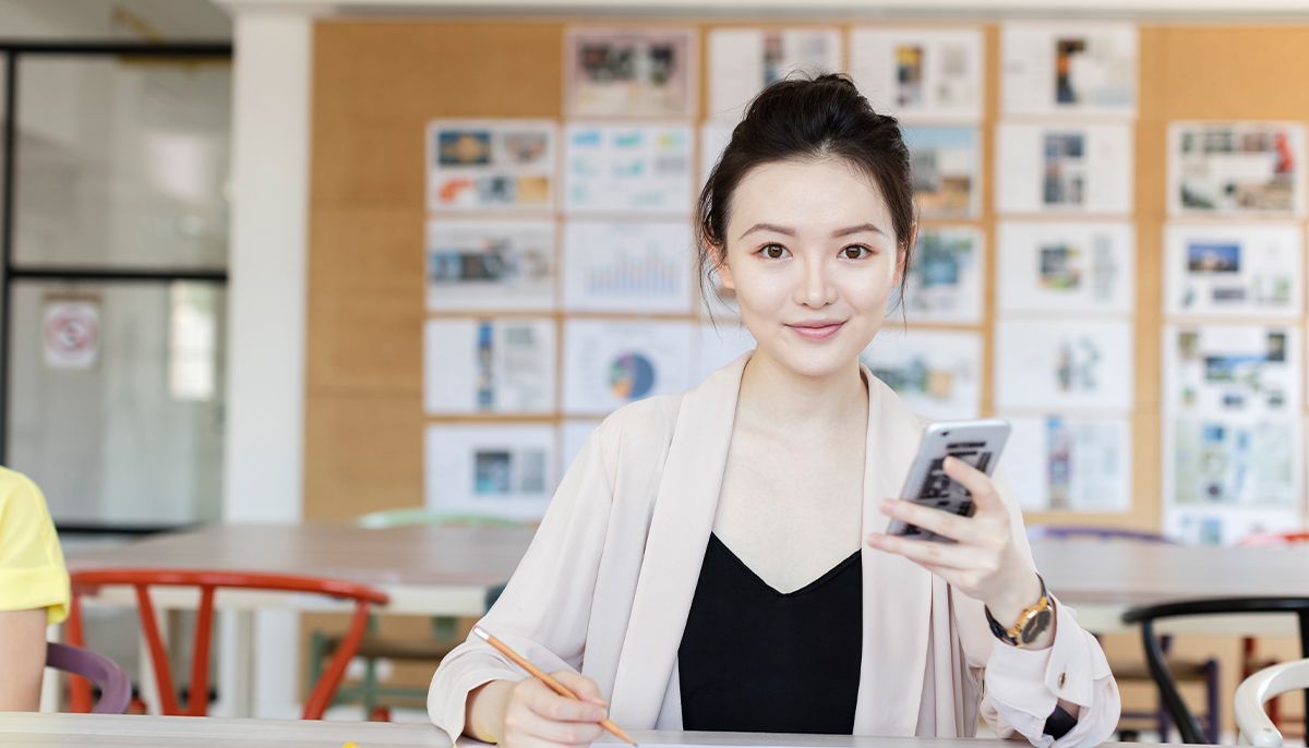 Chinese businessperson using WeChat