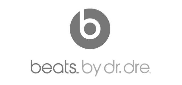 The logo for beats by dr dre is gray and white.