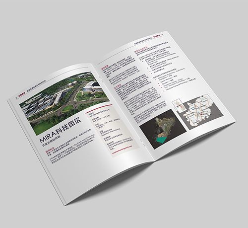 A brochure is open to a page with a picture of a building on it.