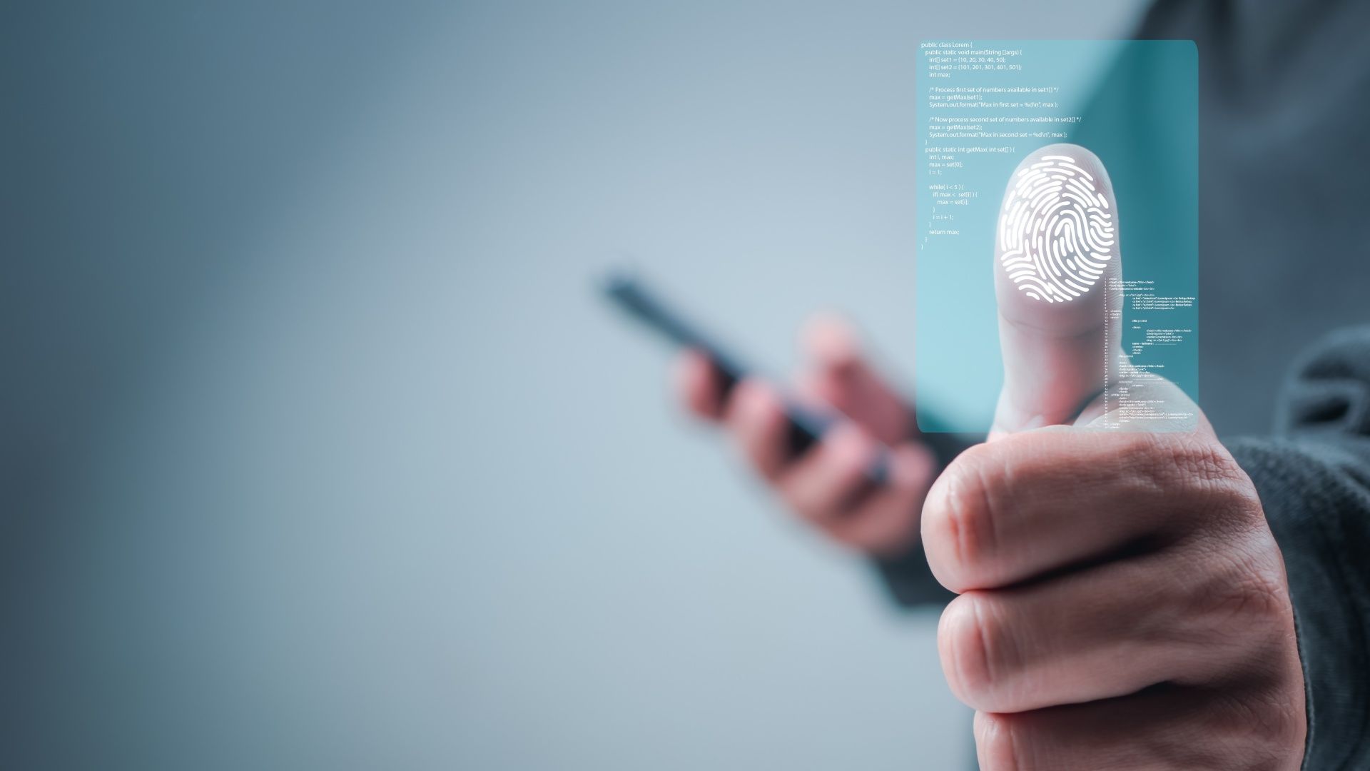 A person is holding a fingerprint while using a smart phone.