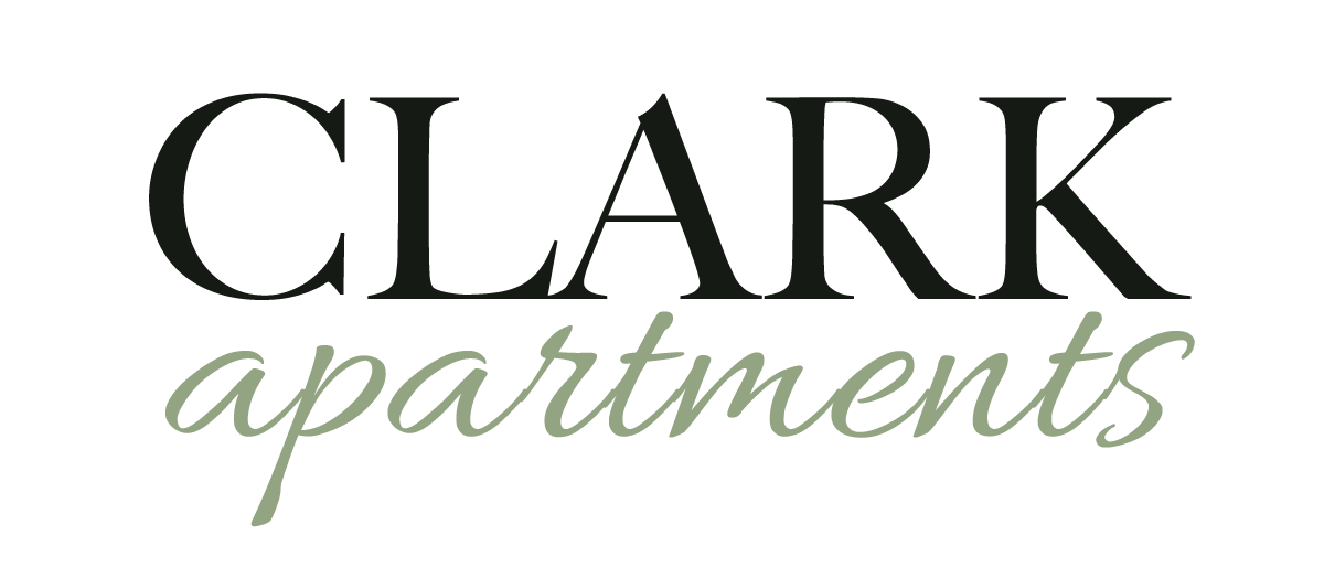 Clark apartments logo in black and green.