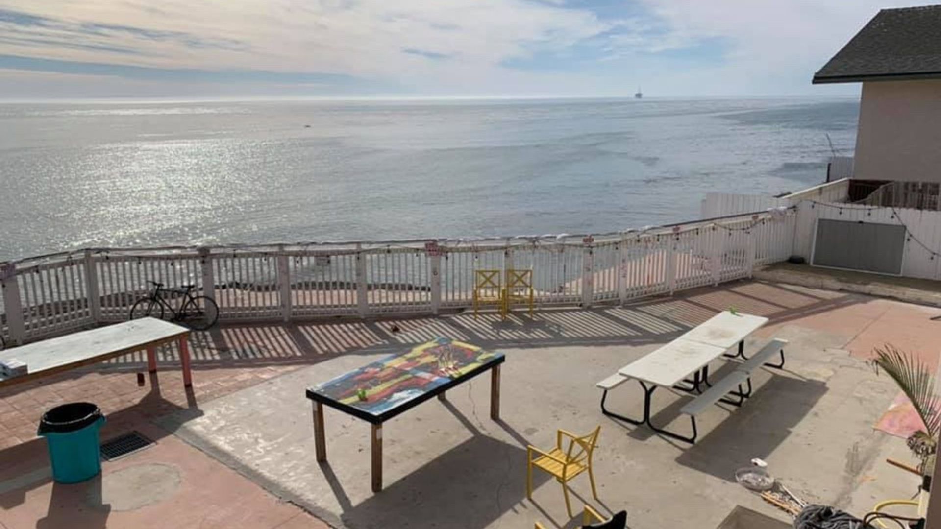 view of ocean from house porch