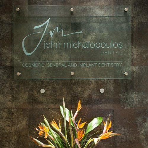 John Michalopoulos logo signage