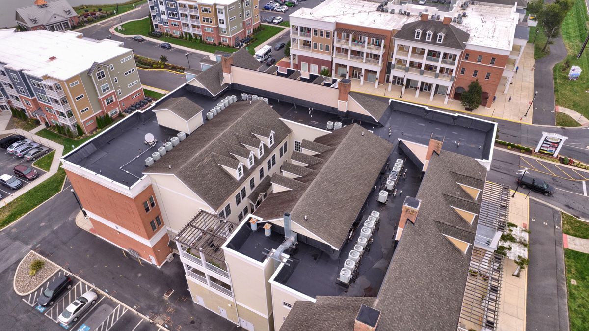 An aerial view of a large building with a lot of windows