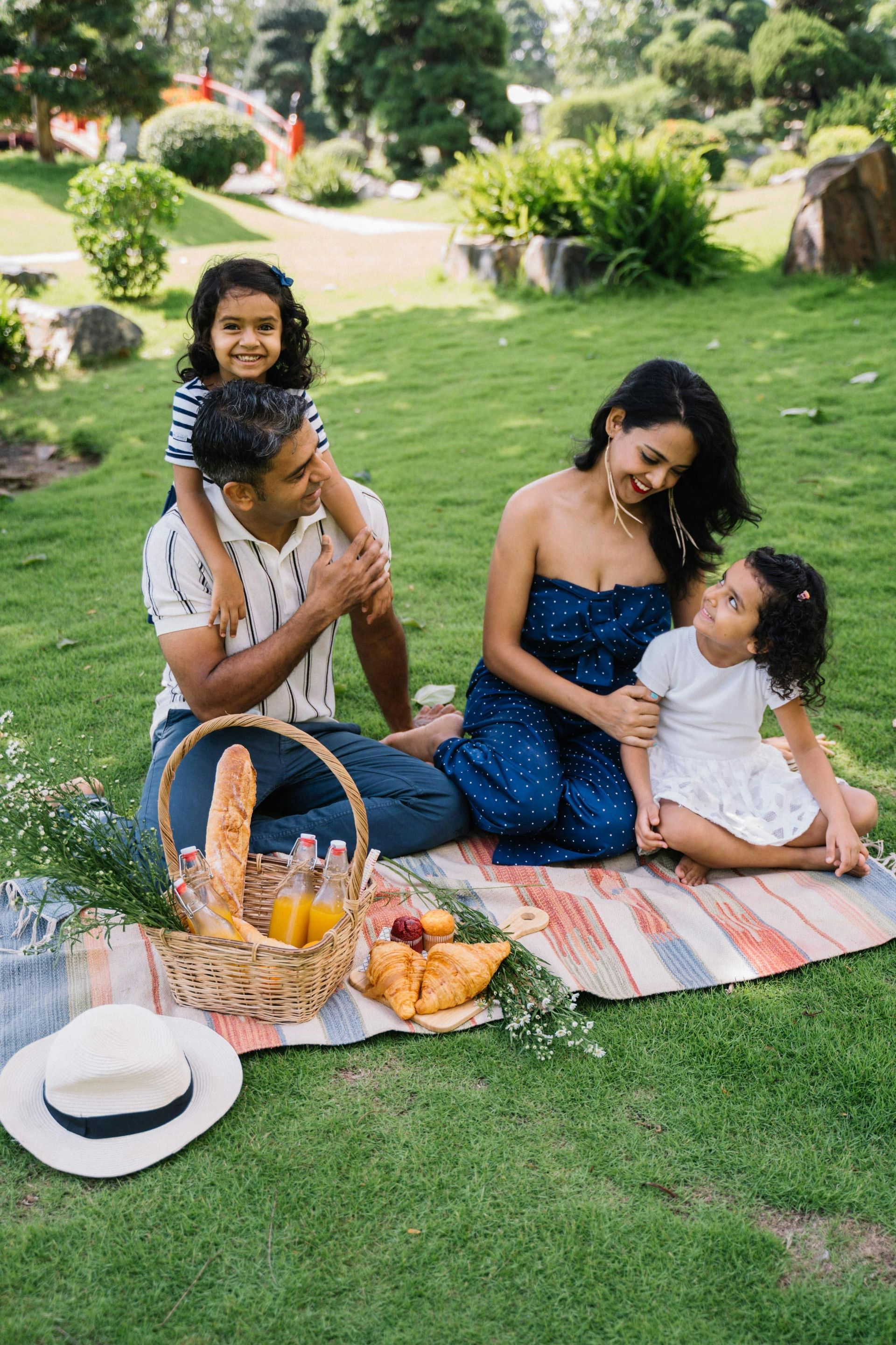 A family is having a picnic in the park.