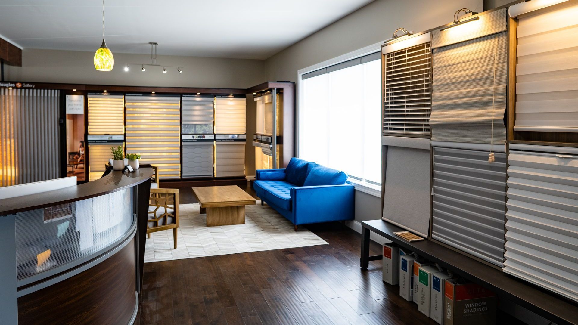Blind & Shutter Gallery showroom in Nashville, TN with a blue couch and window treatment samples
