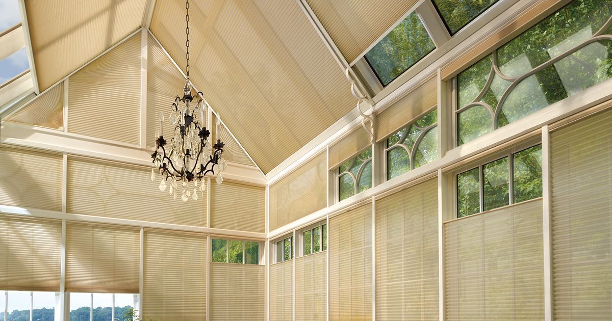 A large room with a chandelier hanging from the ceiling