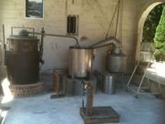 A room with a stove and a scale in it.