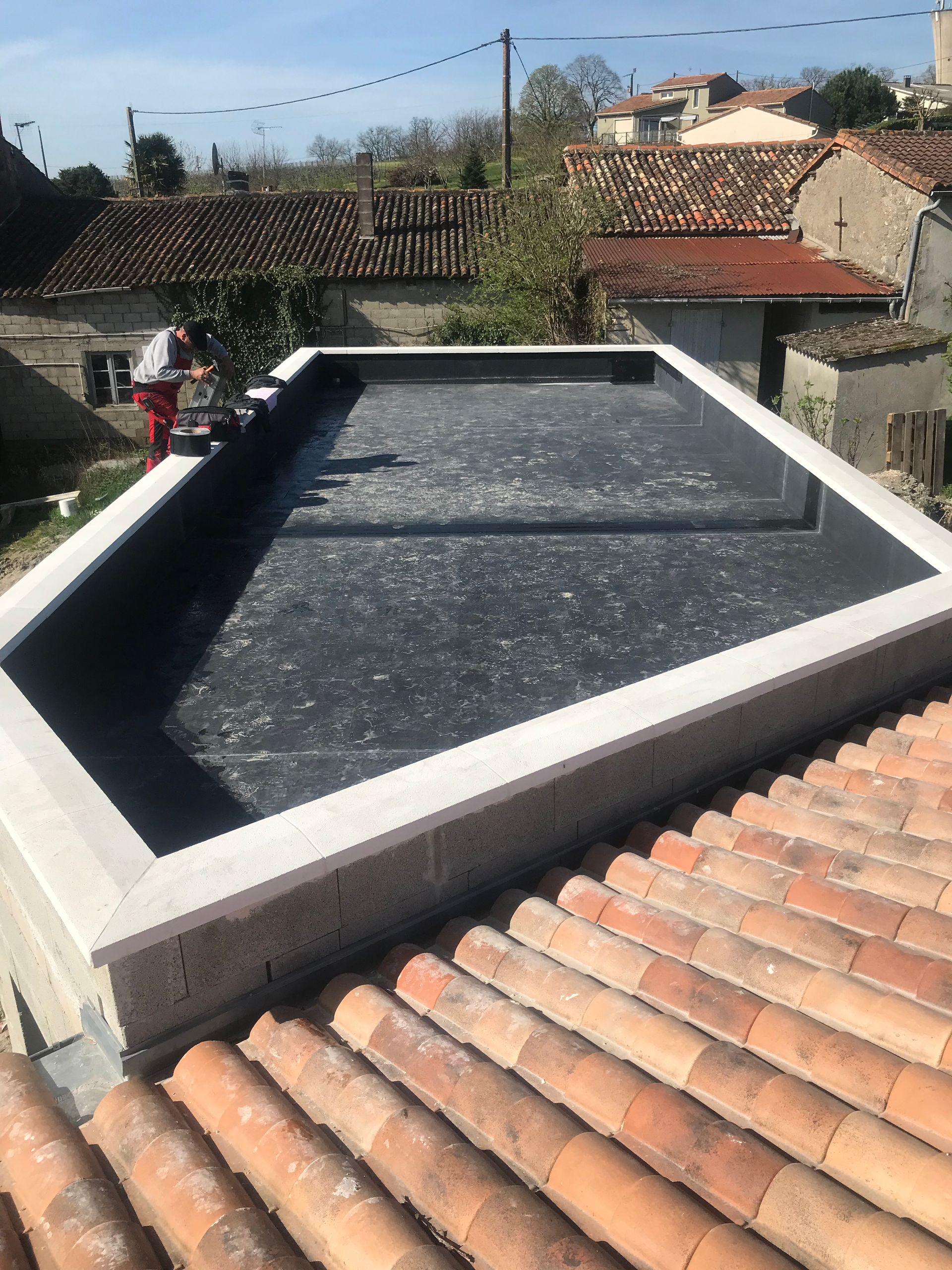 Création d'un agrandissement avec toiture terrasse et étanchéité avec membranes