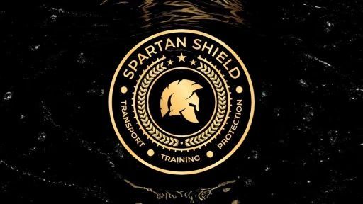 Gold Spartan Shield logo on black background: helmet within a wreath, text
