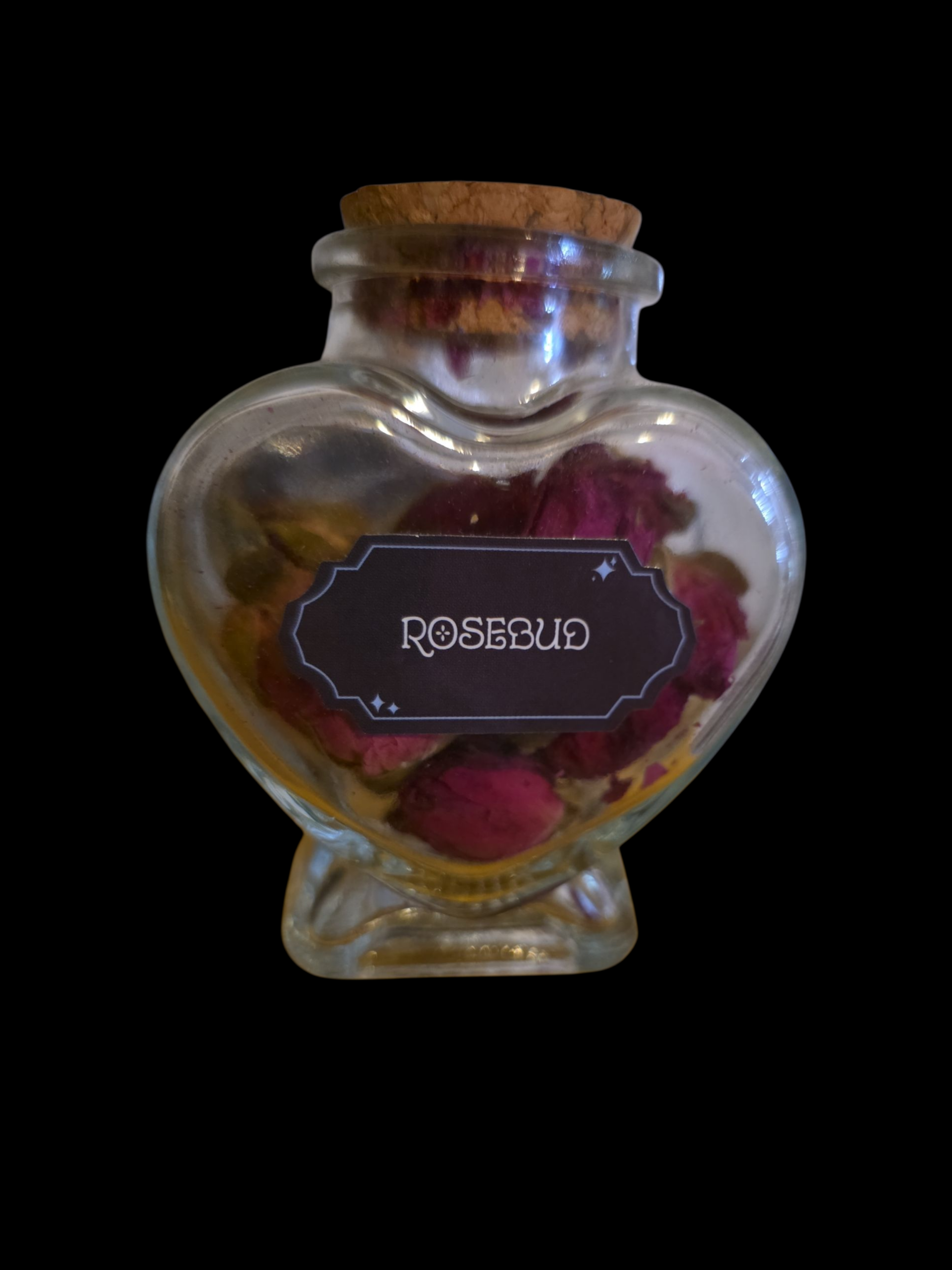 Heart bottle filled with Rosebud