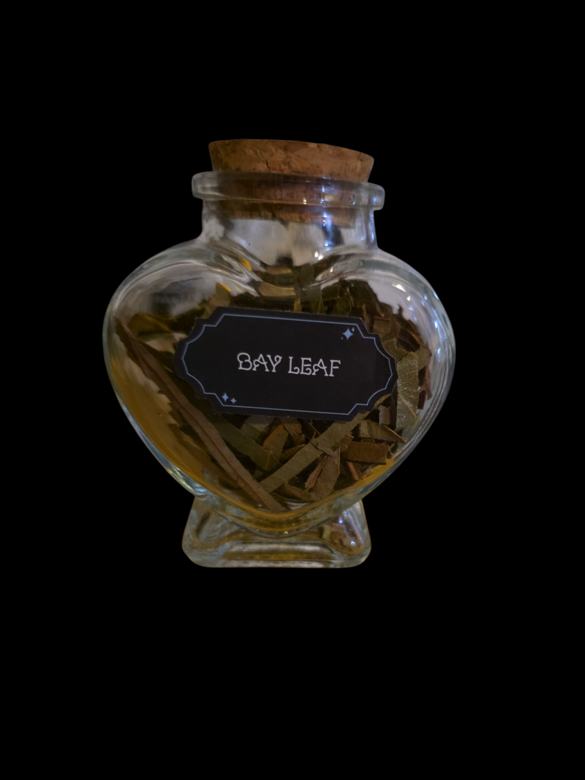 Heart bottle filled with Bayleaf