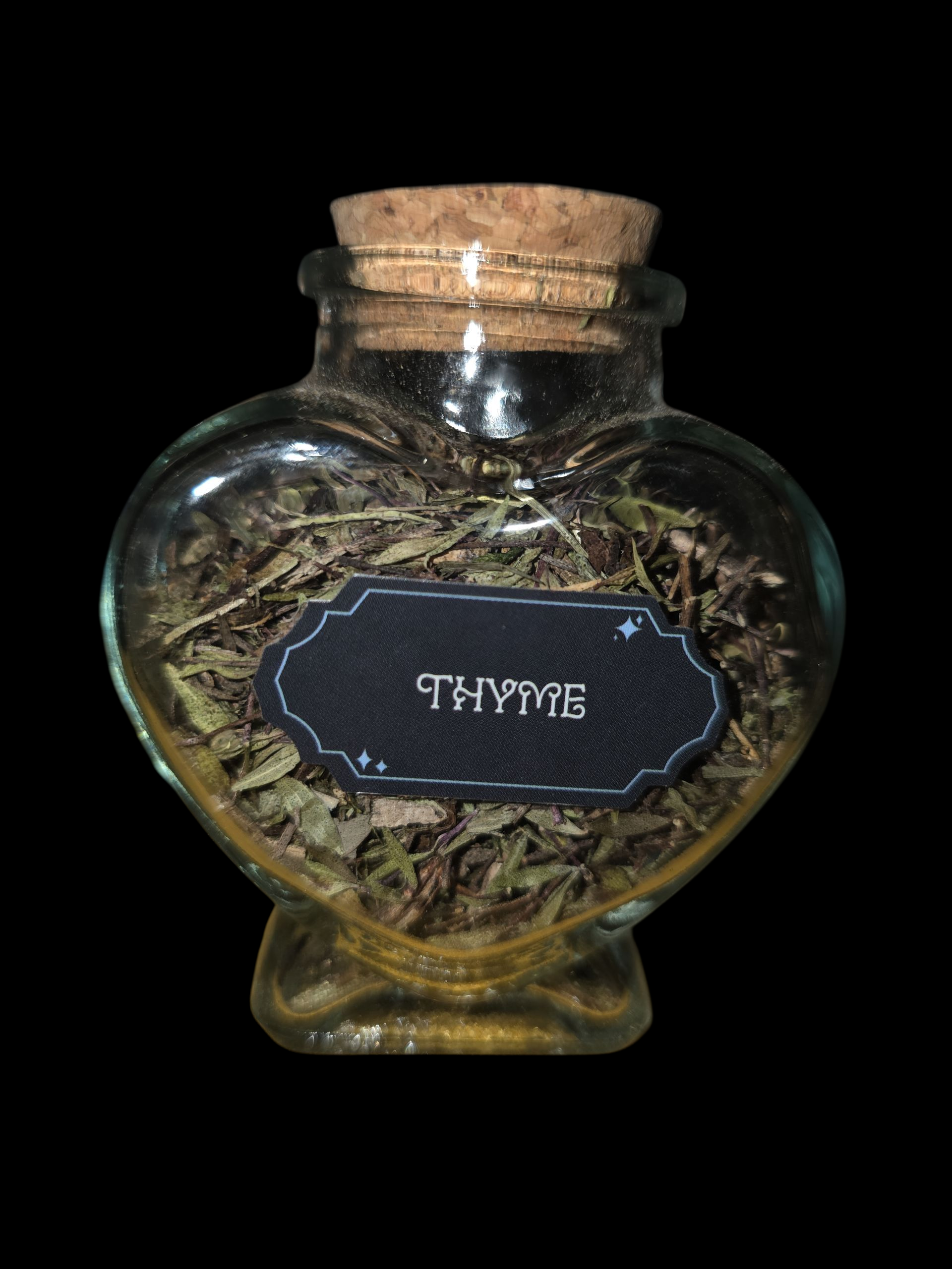 Heart bottle filled with Thyme