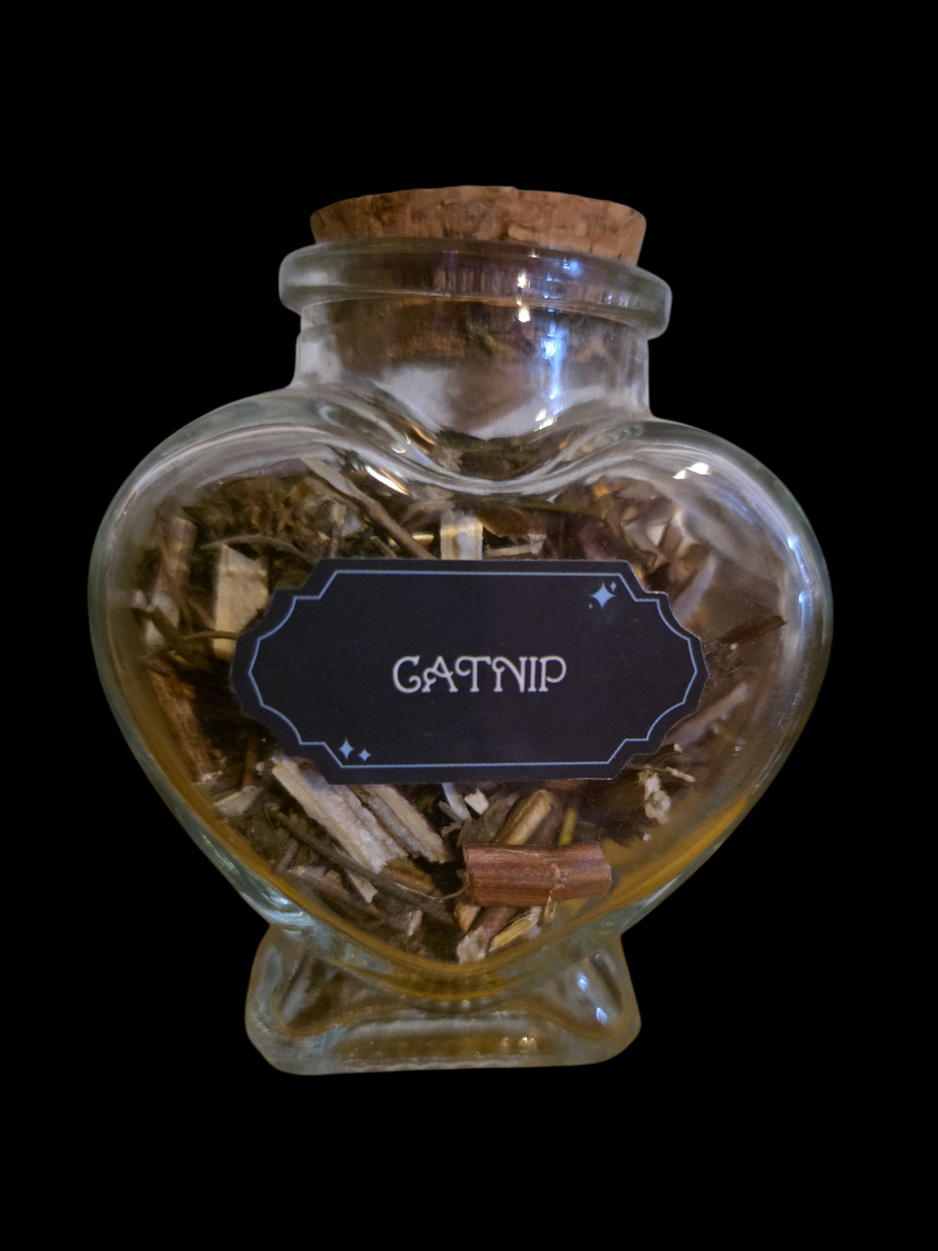 Heart bottle filled with catnip