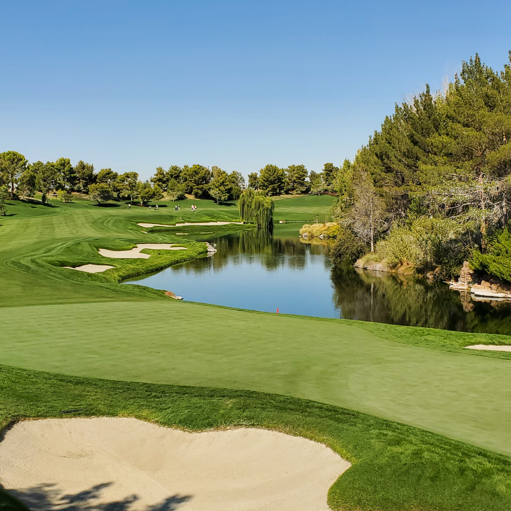 iconic golf course, large water hazard and fairway.