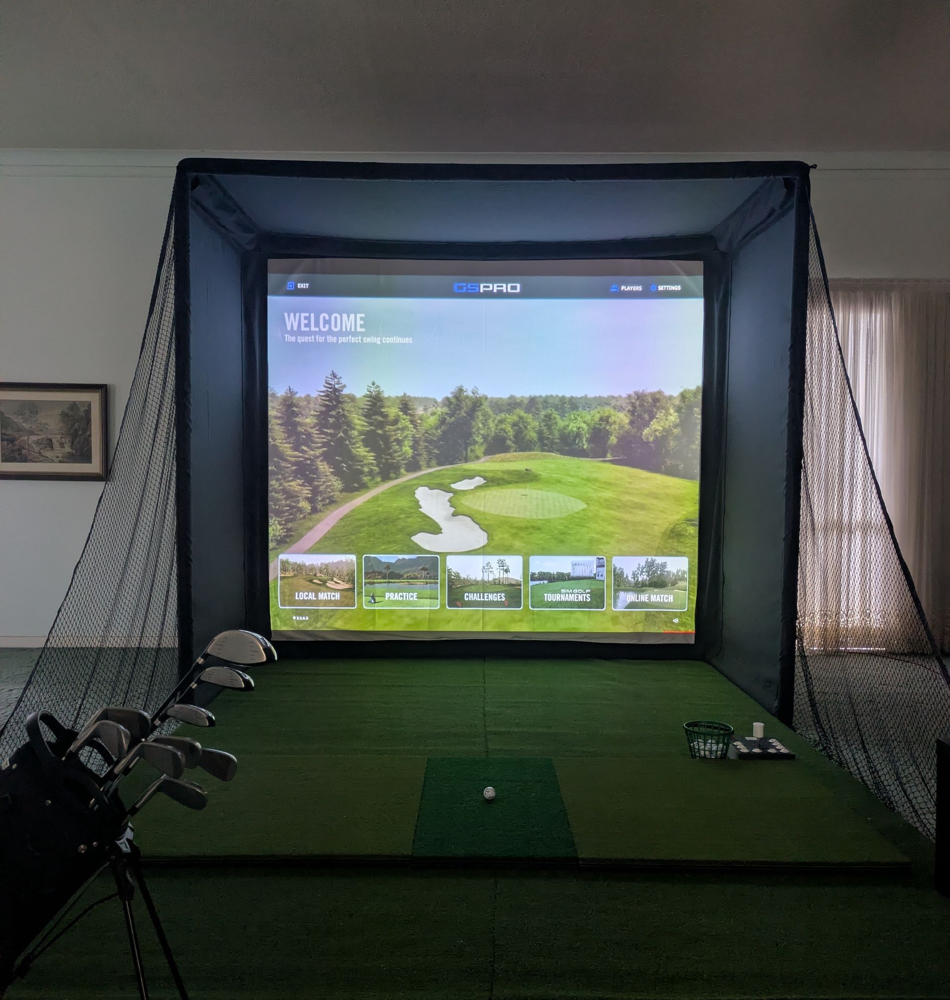 Mobile Golf Co. indoor golf simulator enclosure setup