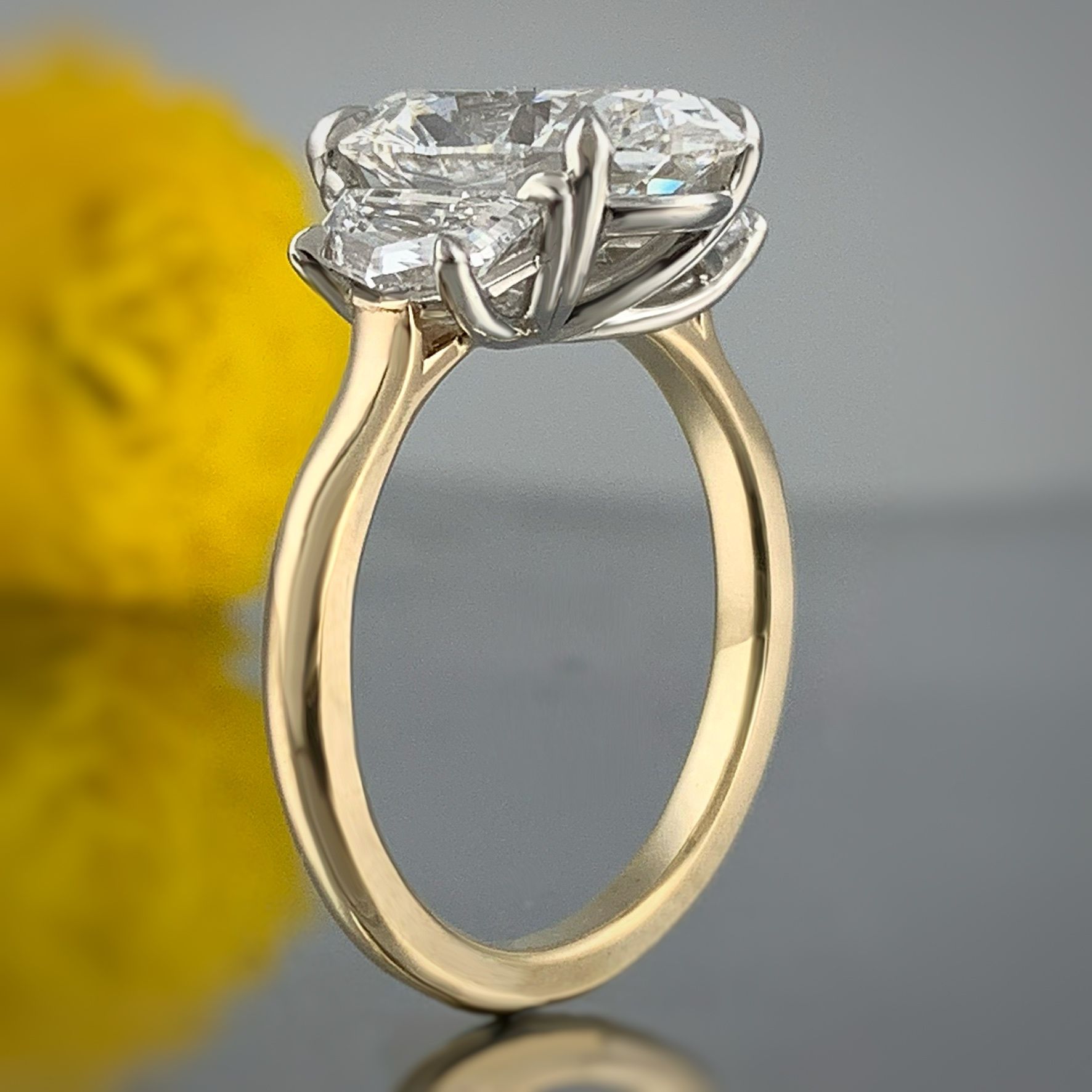 A diamond ring with a large diamond in the center