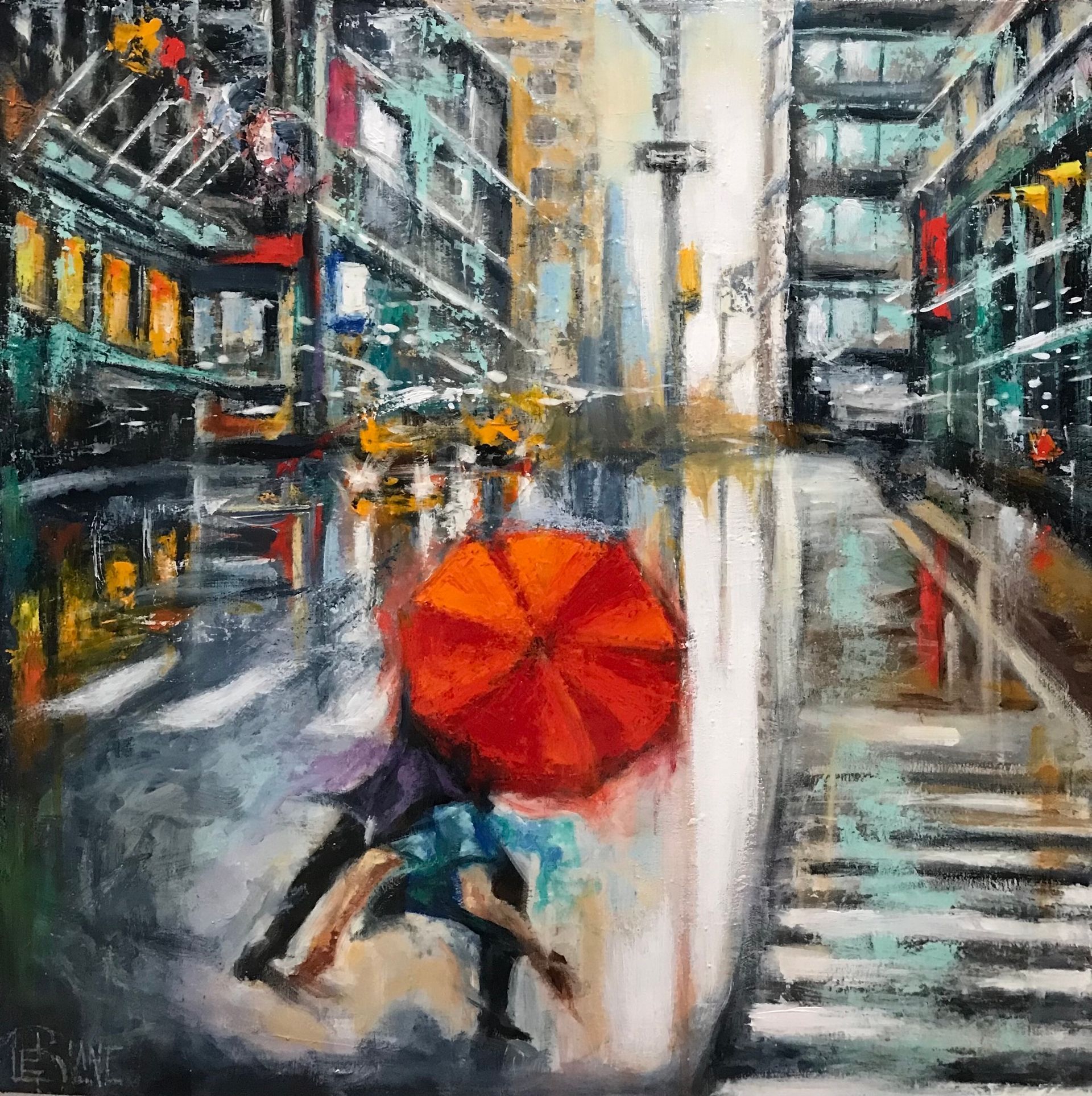 Mountain landscape with snow-capped peak, trees, and lake reflecting the sky's orange and blue colors.