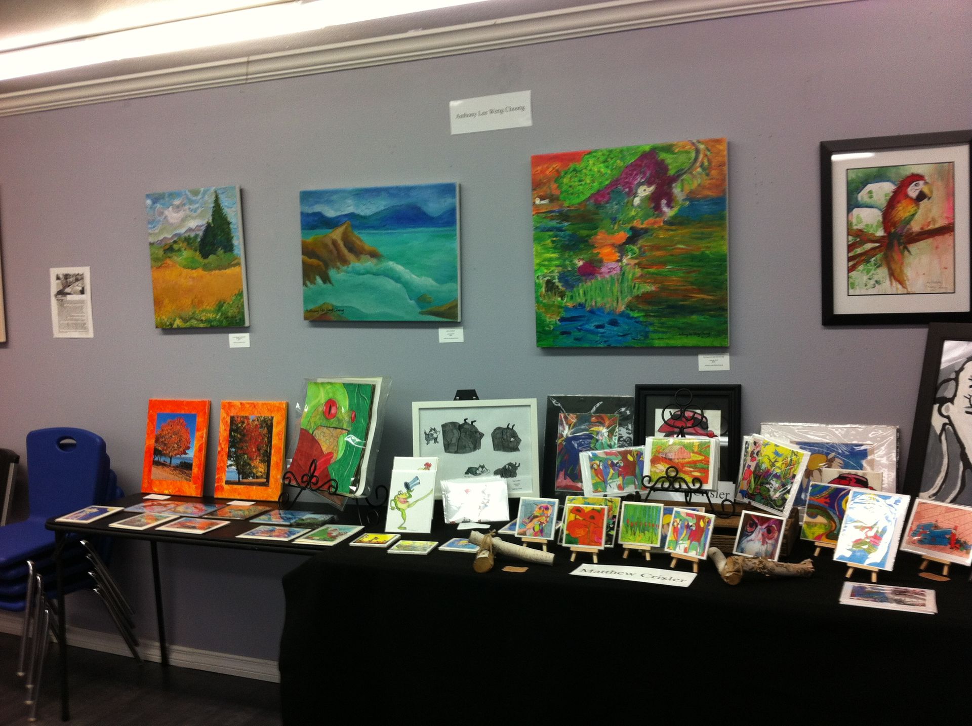 Two children holding hands, walking towards a colorful forest with a stream.