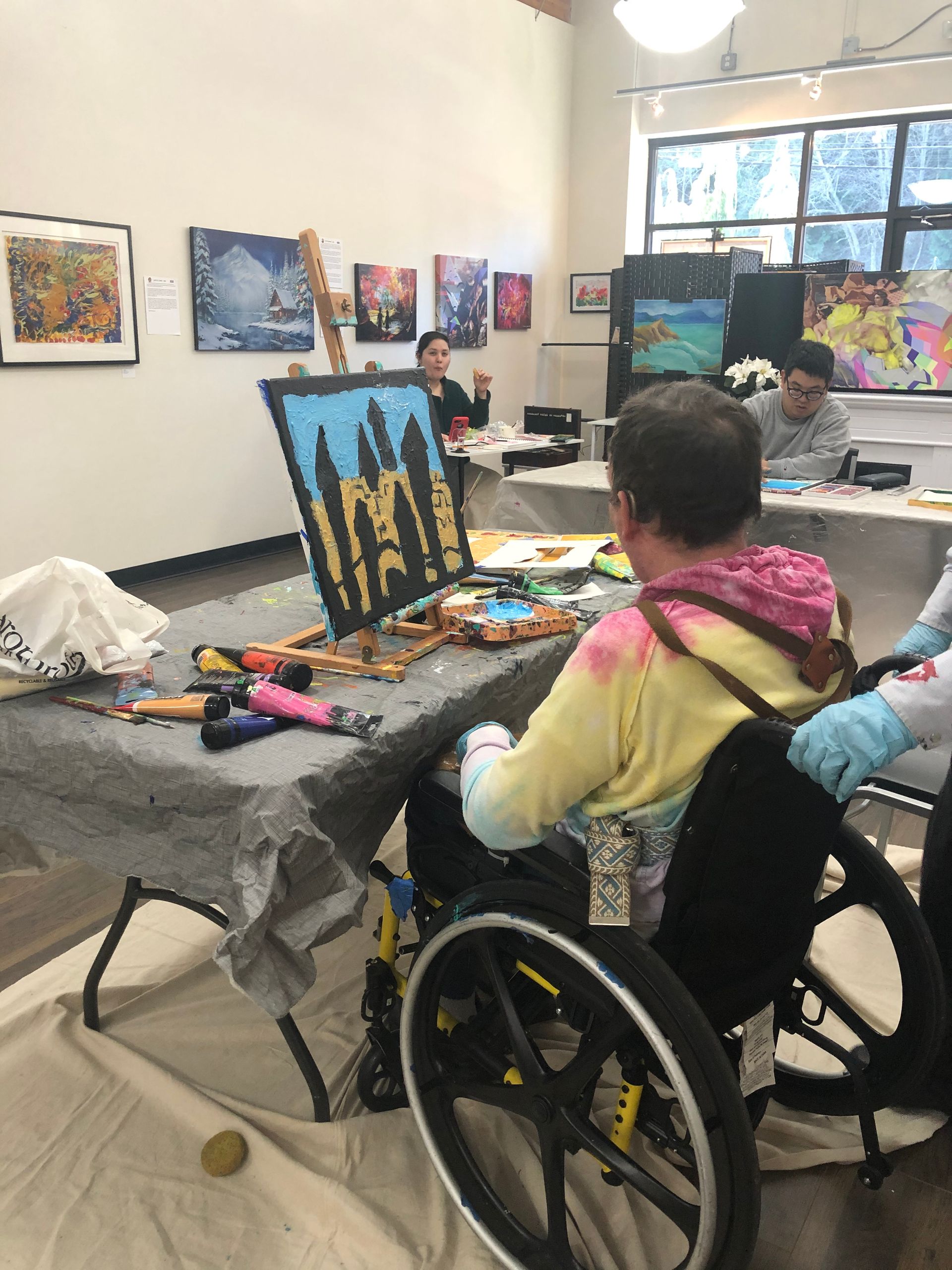 Close-up charcoal drawing of a snow leopard. The animal's face is detailed, with intense eyes and a thoughtful expression.