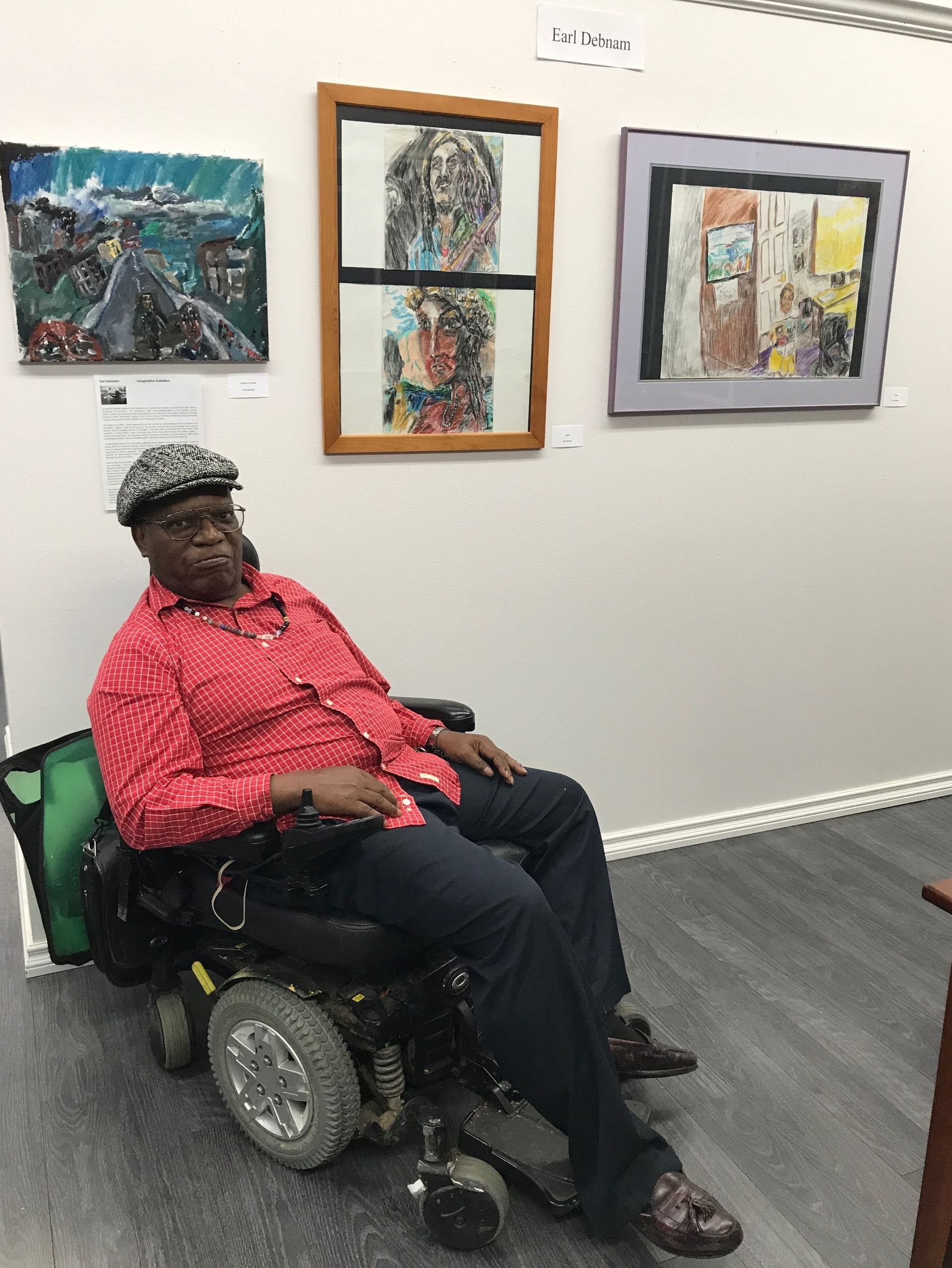 Mountain landscape with snow-capped peak, trees, and lake reflecting the colorful sunset.