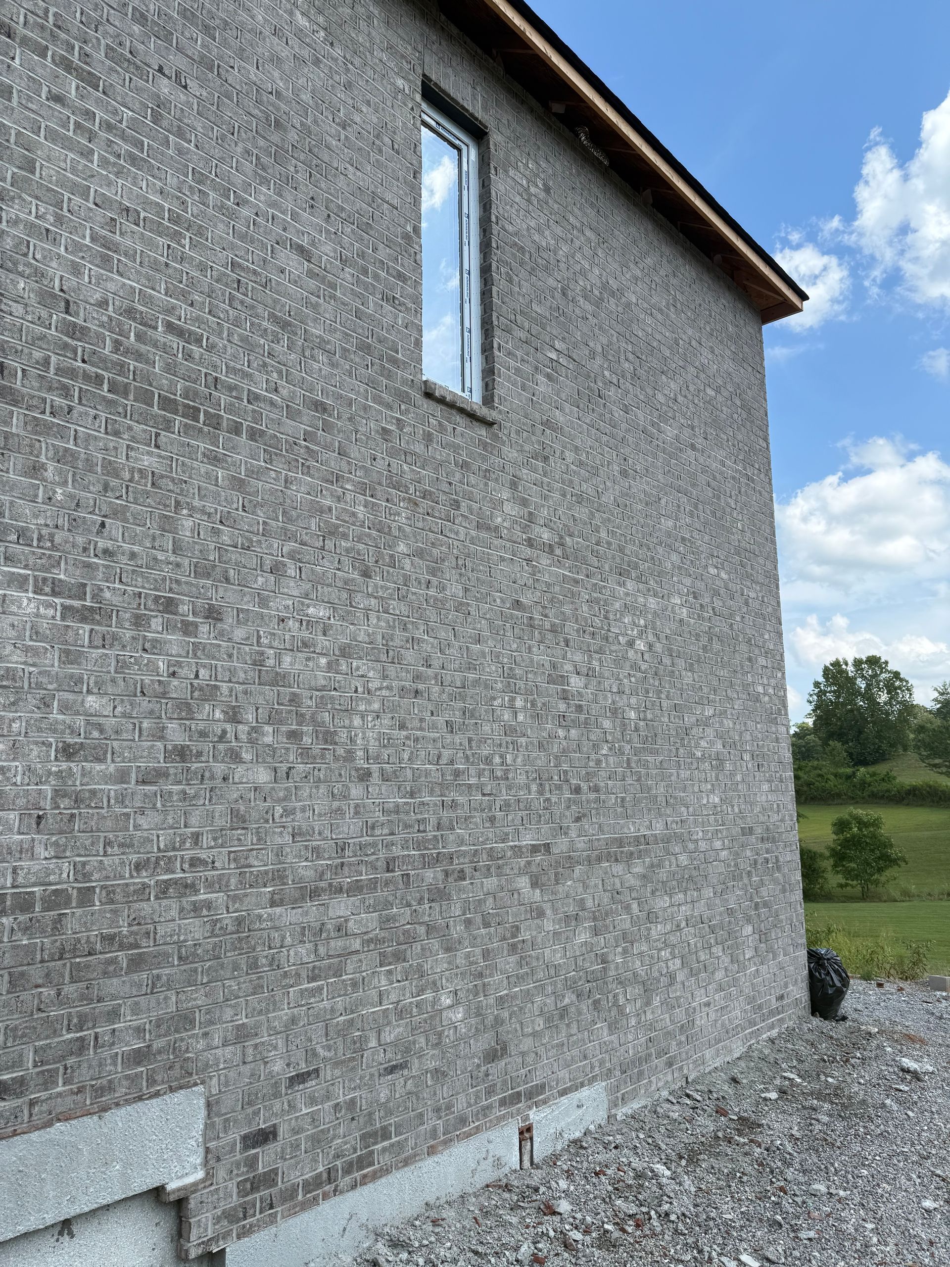 Red Stone Brick Wall — Knoxville, TN — DMD Masonry, LLC