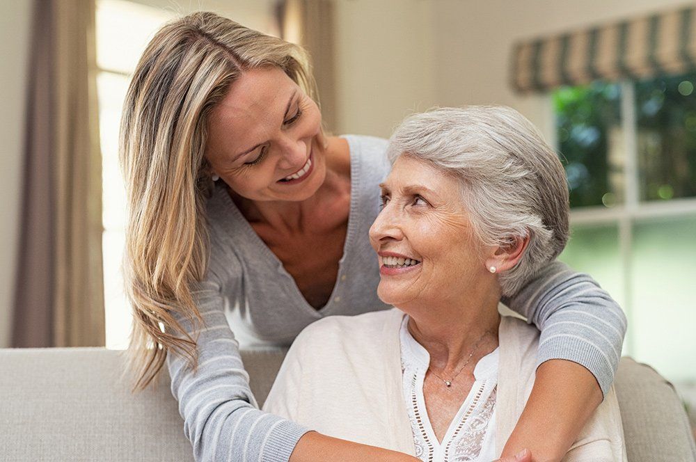Hospice Care — Woman Embracing Senior Mother in Columbus, OH