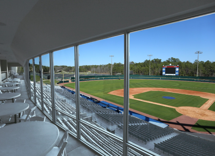 A view of a baseball field from inside a stadium
