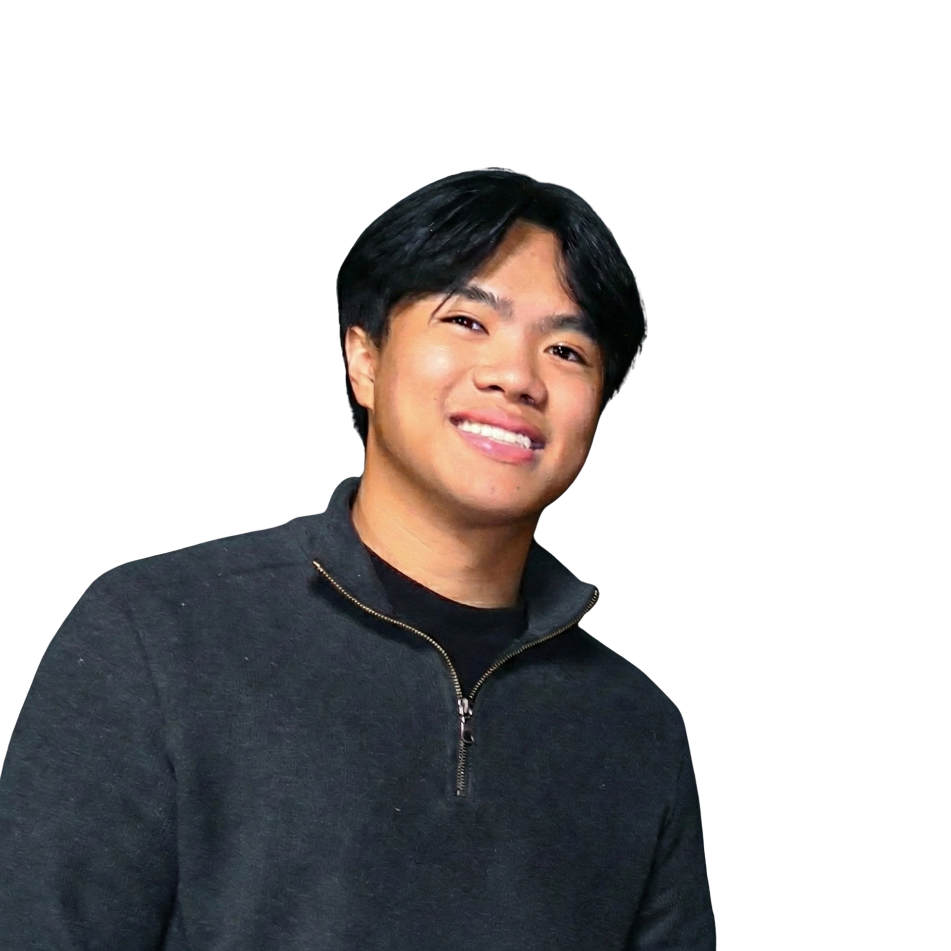 Man wearing a red baseball cap with white logo smiles at the camera, black shirt.