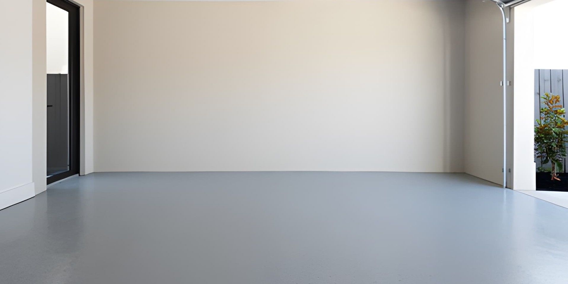 Polished concrete floor with blue and green geometric design.