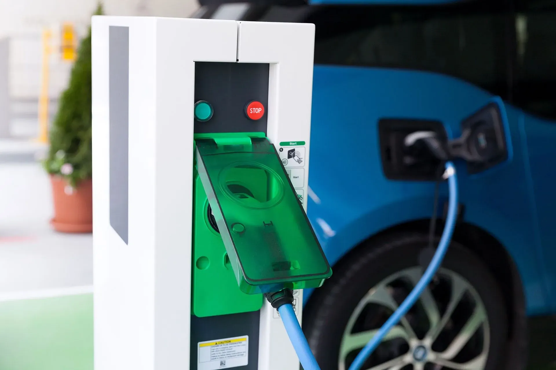 car on EV charging station