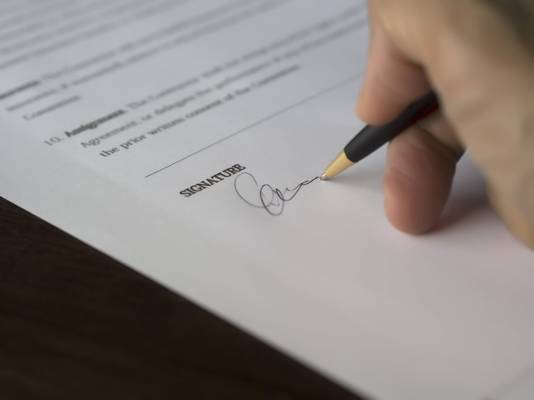 Person signing agreement
