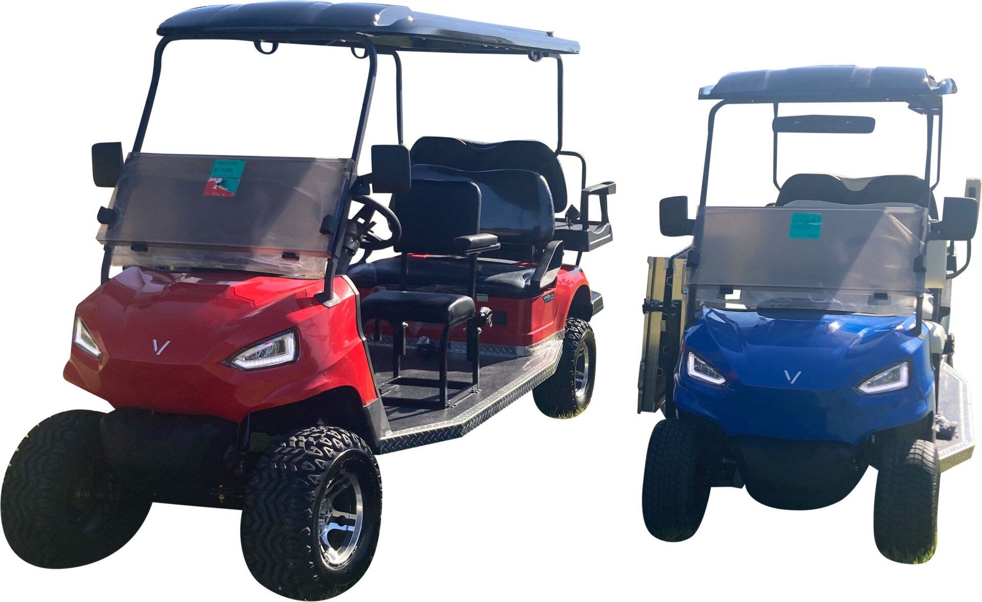 Two wheelchair golf carts from PHED Mobility - red and blue