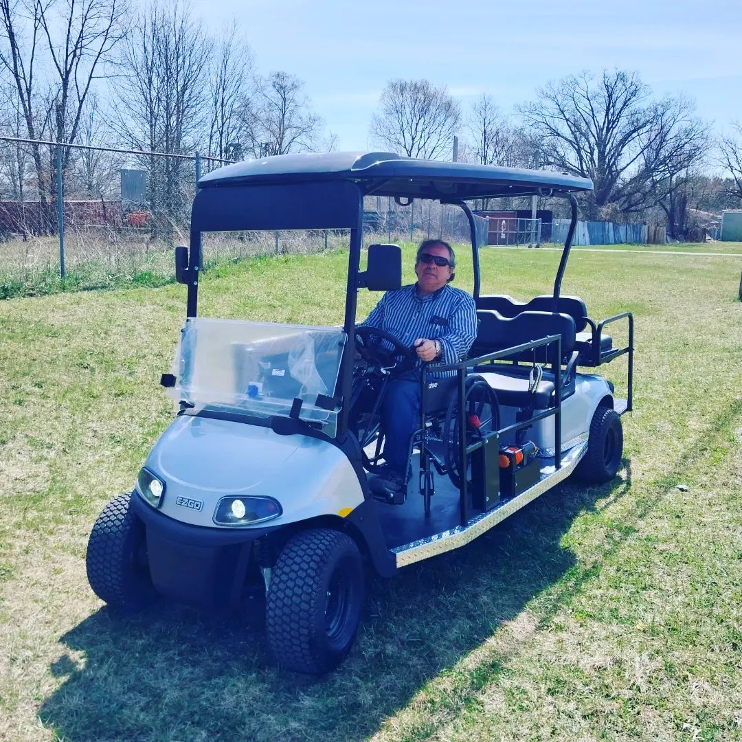 The RUNABOUT wheelchair golf cart by PHED Mobility allows wheelchair users to drive their golf cart directly from their wheelchair.