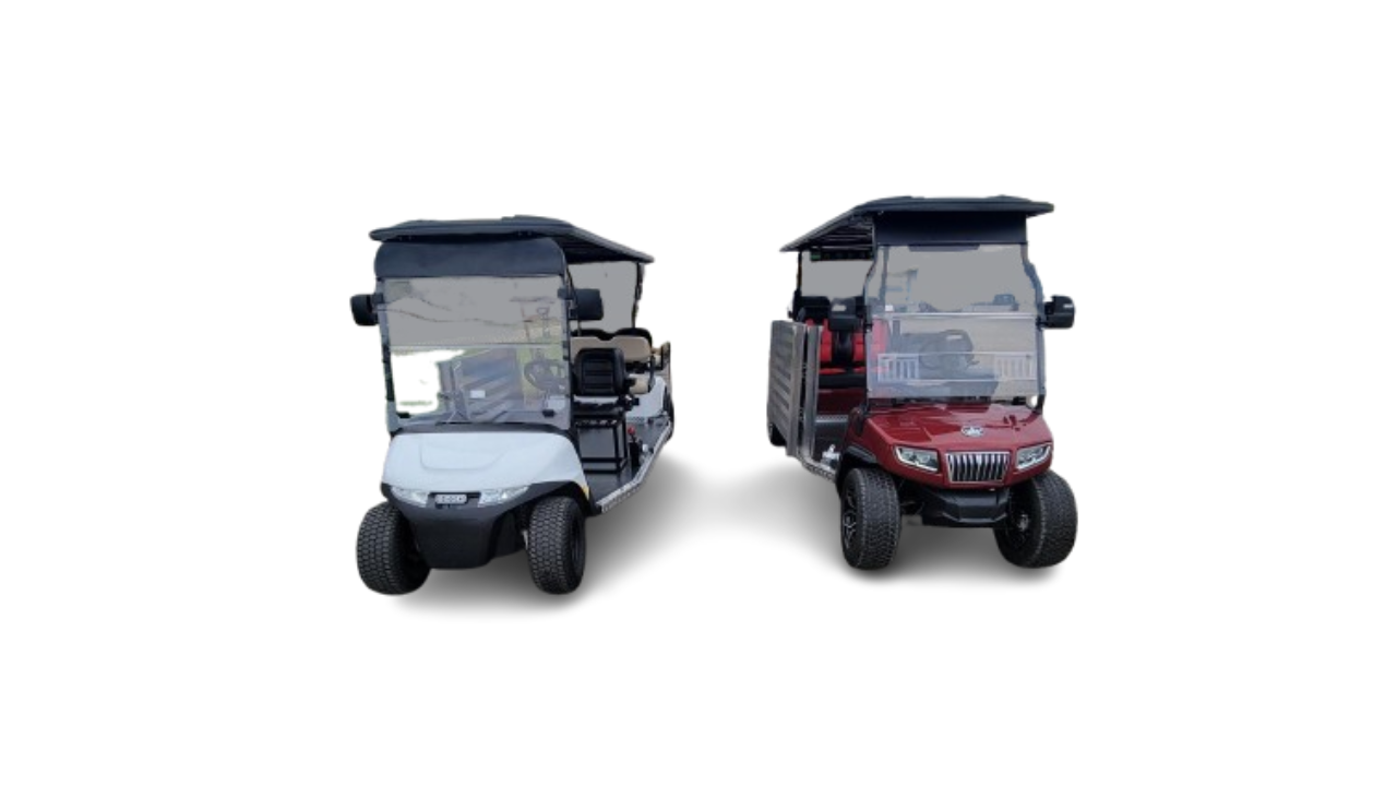 Two golf carts are sitting next to each other on a white background.