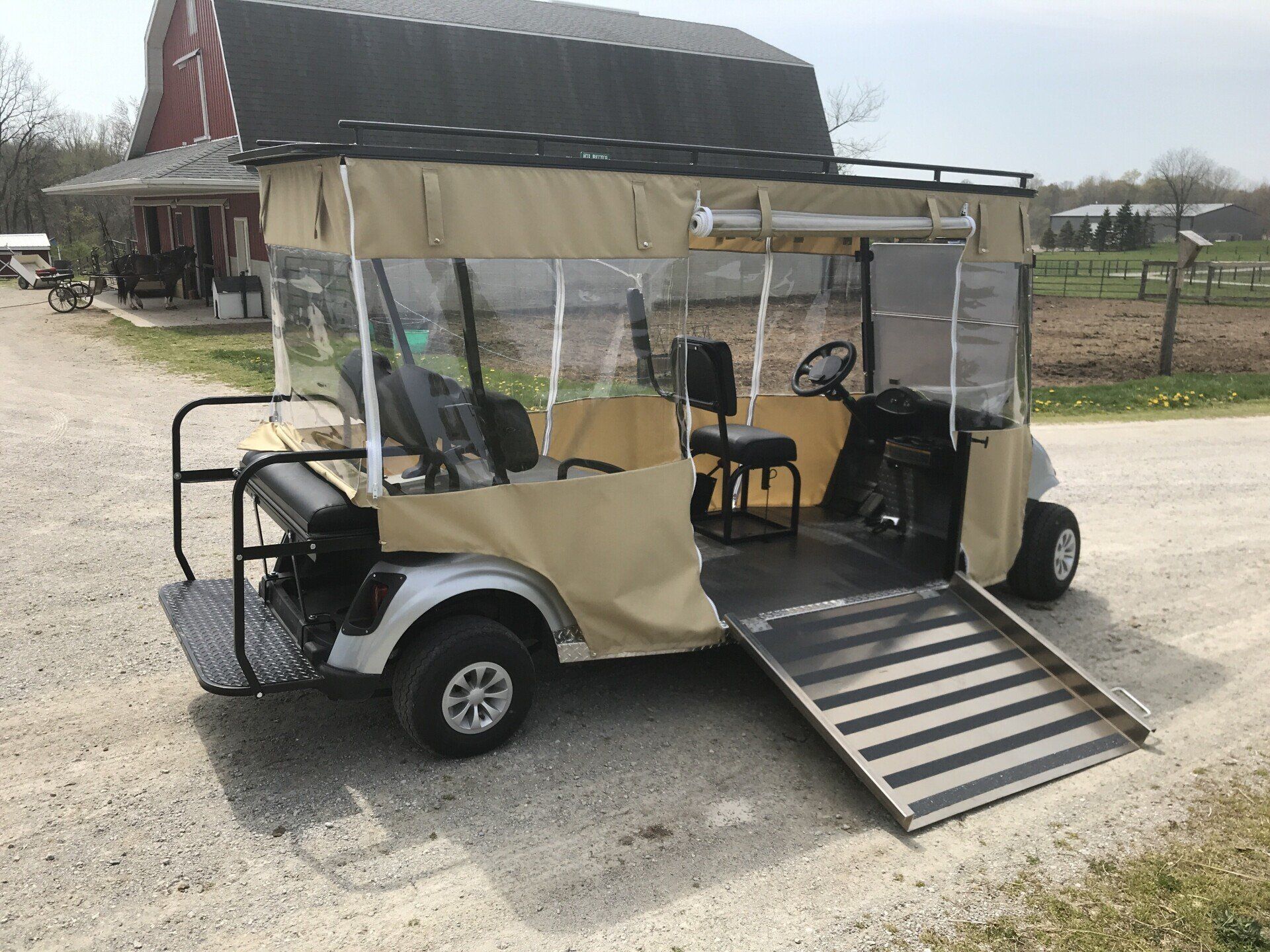 A golf cart with a canopy on top of it