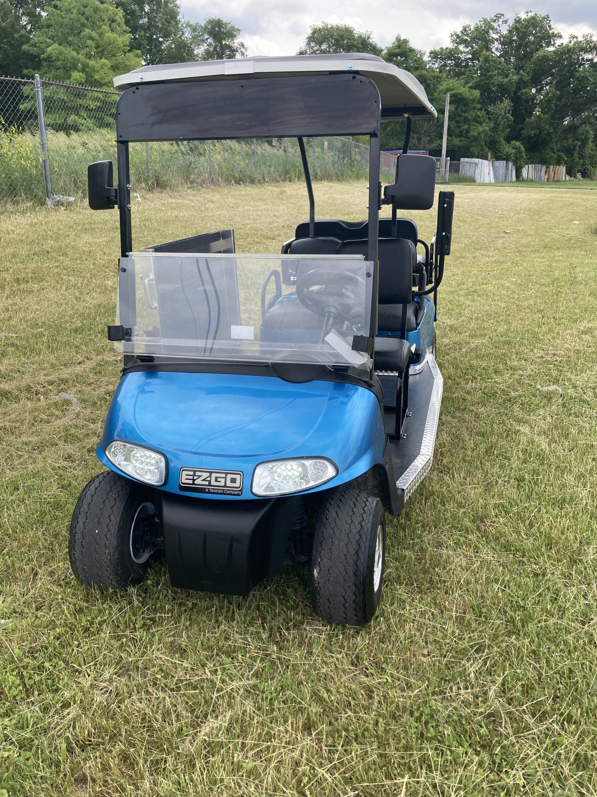 Cobalt blue front view EZGO TXT -  wheelchair golf cart from PHED Mobility
