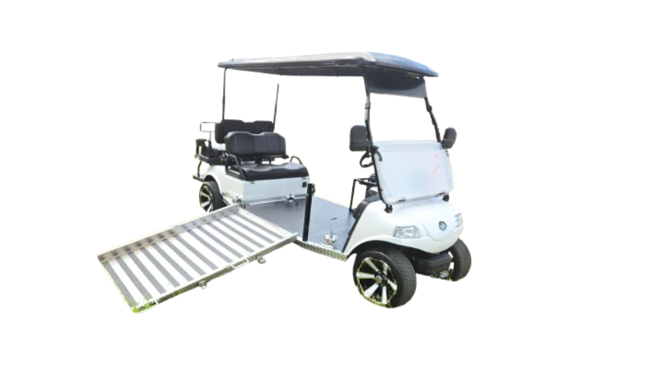 A white golf cart with a ramp attached to it.