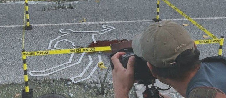 Photographer at a crime scene