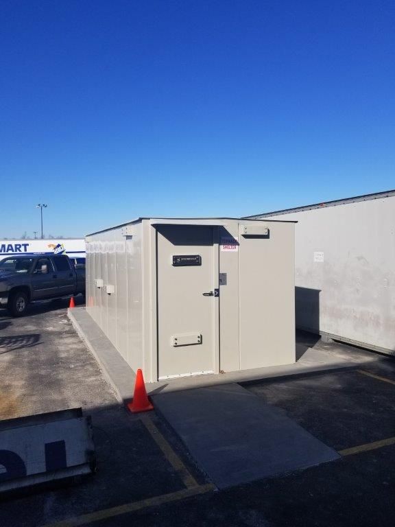 Commercial storm shelter outside of Walmart done by Stronghold | Missouri and Arkansas