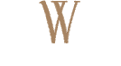The letter w is made of wood and is on a white background.