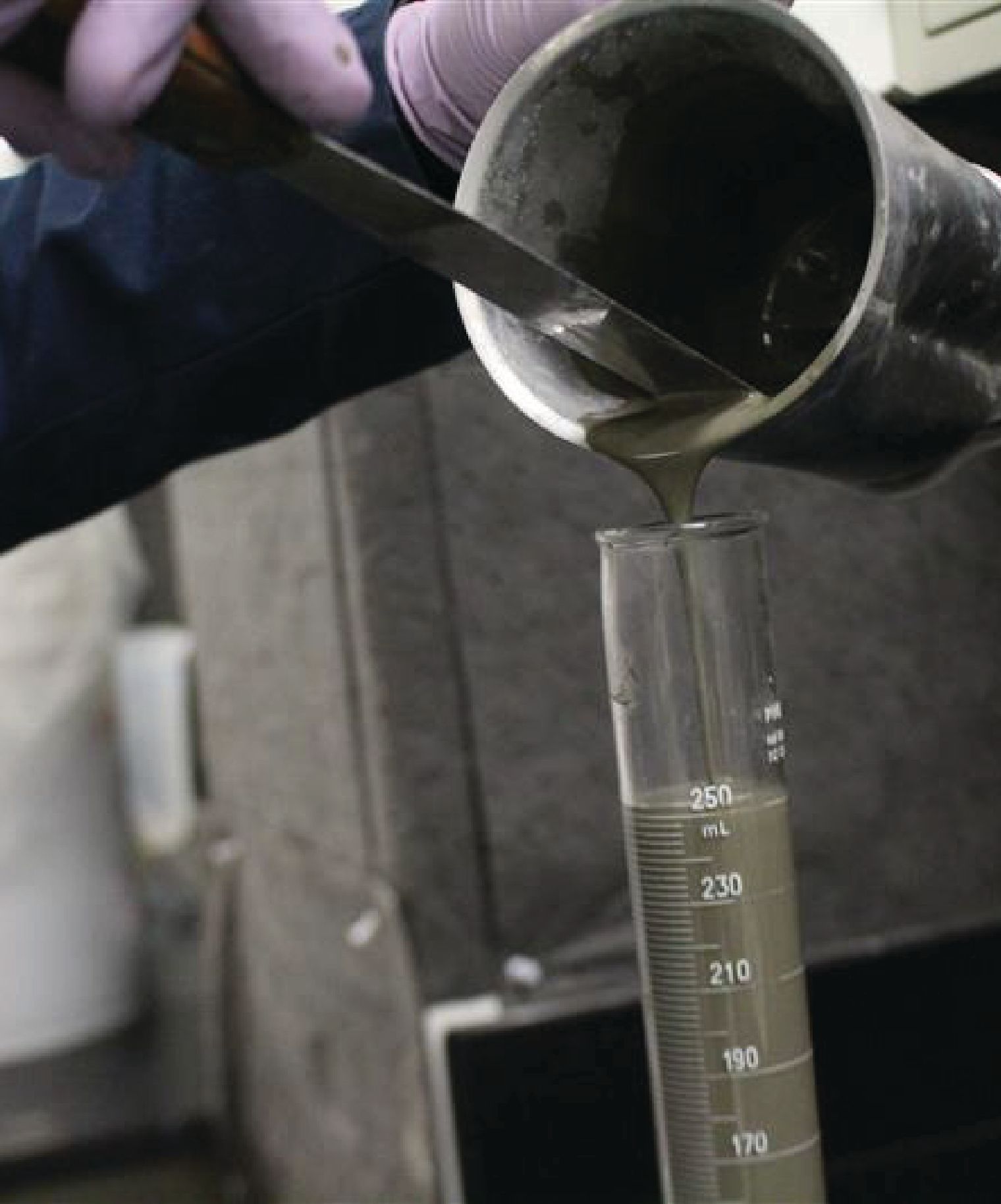 Cement Pouring into a beaker