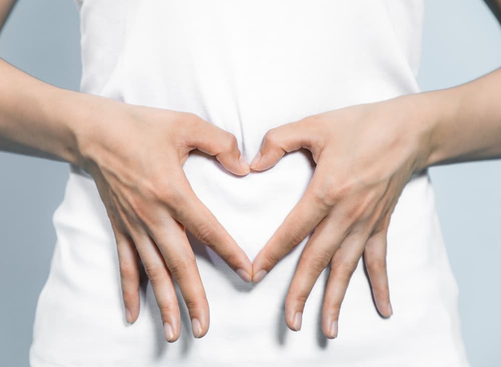 Hands in Shape of Heart over Stomach