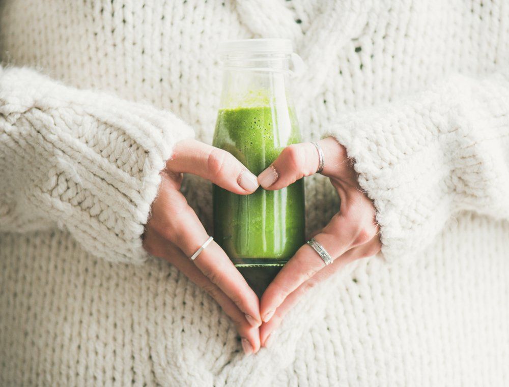 Female Holding Green Smoothie - Juice Cleanse In Shell Cove, NSW