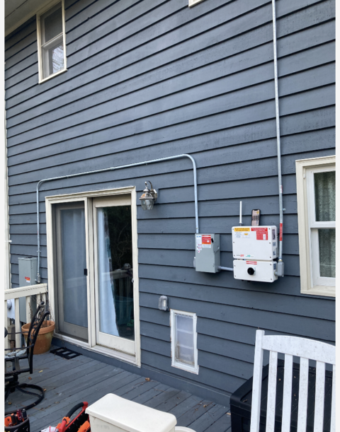 The back of a house with a sliding glass door