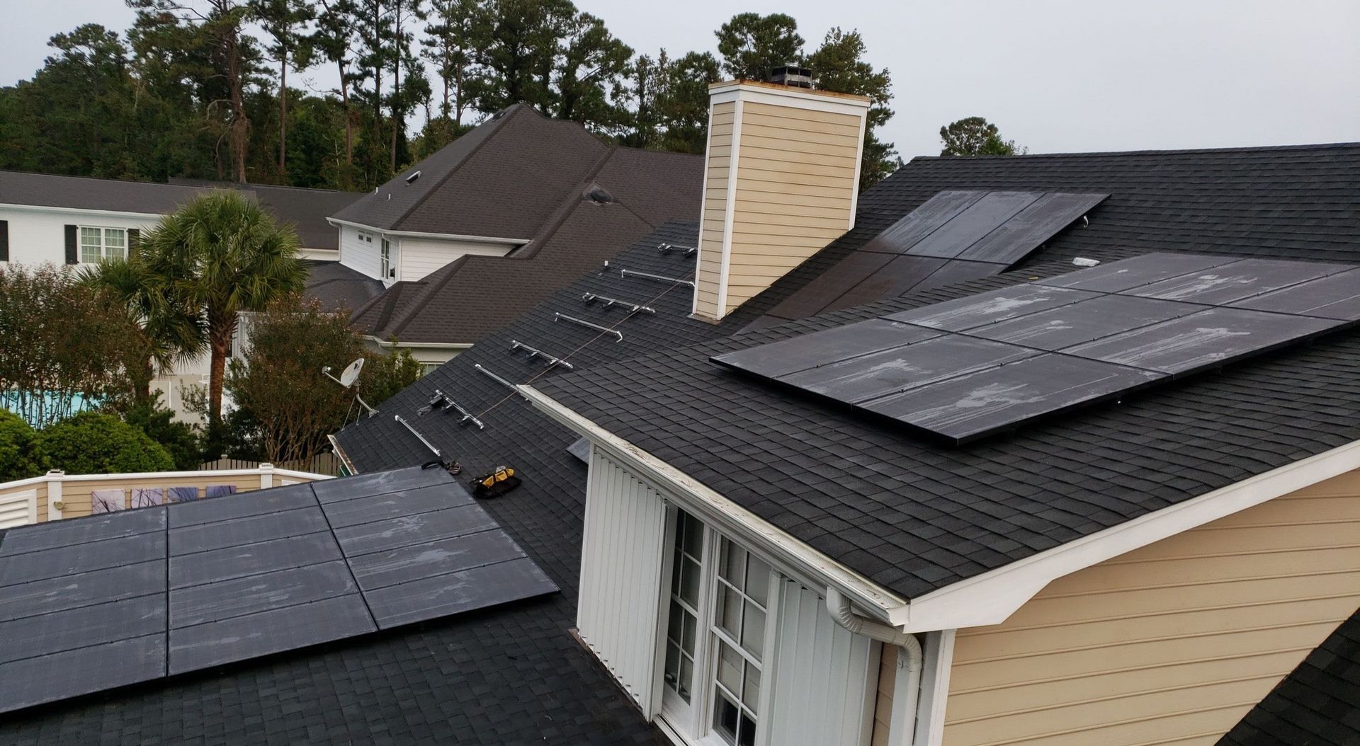 A roof with a lot of solar panels on it
